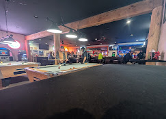 Pool tables and game room inside the Desert Rose on opening night